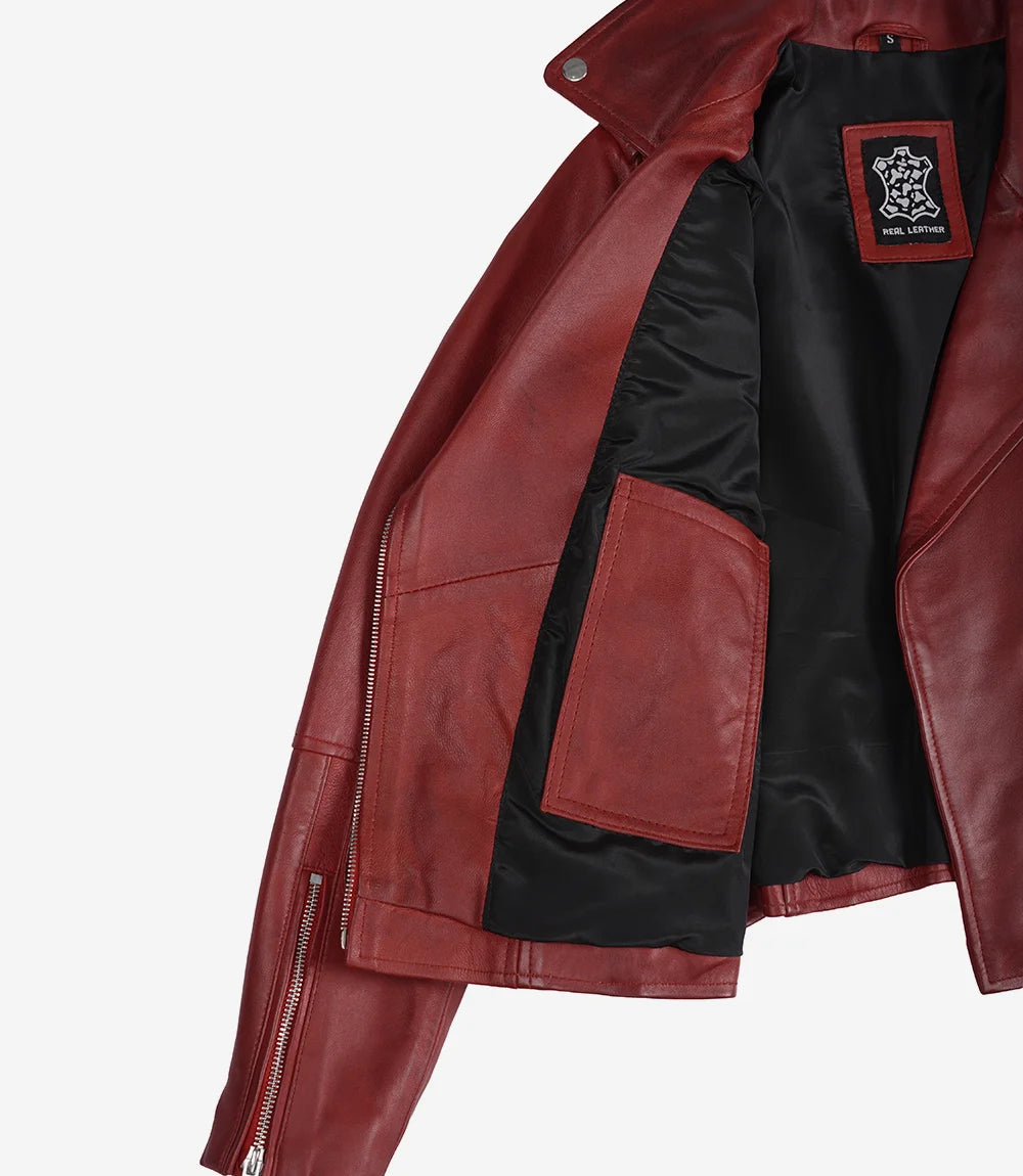 Veste en cuir asymétrique rouge style motard pour femme avec ceinture